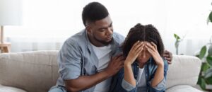 Husband helping spouse with mental illness